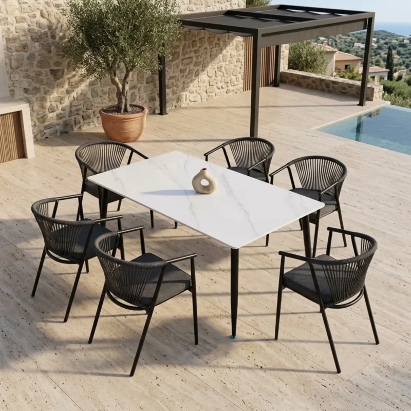 Comedor rectangular 6 sillas Melodi color negro para jardin y exteriores; mesa de piedra sinterizada Blanca Marmoleada de 150x90 cm.